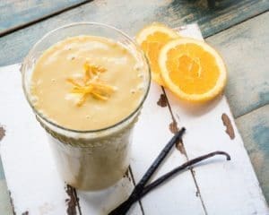 Side shot of vegetarian and gluten free Perfectly Healthy Orange Vanilla Smoothie is Creamy and refreshing made with Botanica Perfect Protein Vanilla