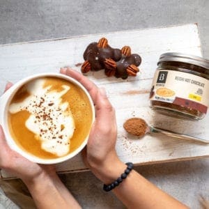 Superfood Beverage Foamy Coconut Mocha latte made with Botanica Health Reishi Hot Chocolate -