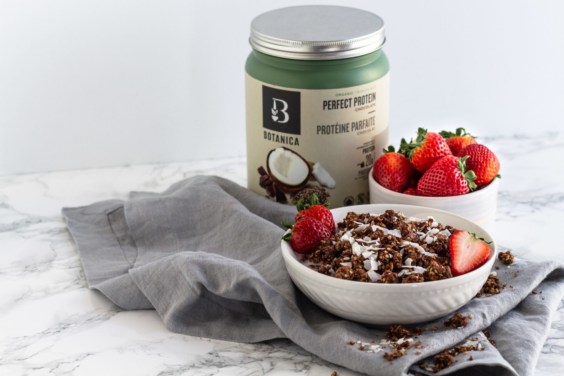 Protein packed chocolate granola recipe using Botanica health perfect protein chocolate protein powder. vegan and gluten free made with real food ingredients.