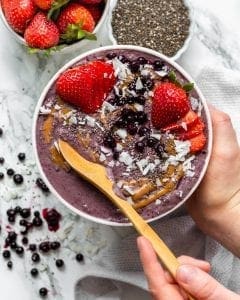Acai Berry Smoothie Bowl made with Botanica Perfect Greens Berry and Perfect Protein Vanilla. Gluten free and vegan smoothie bowl